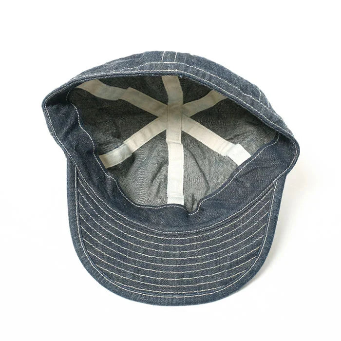 Blue denim cap with a white interior on a white background