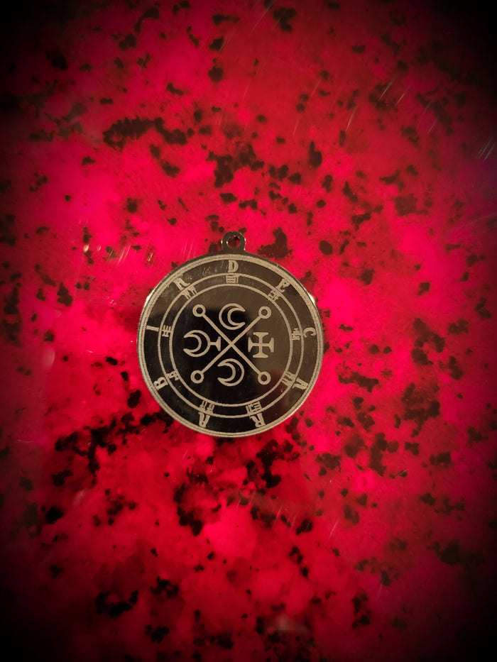 black decarabia pendant