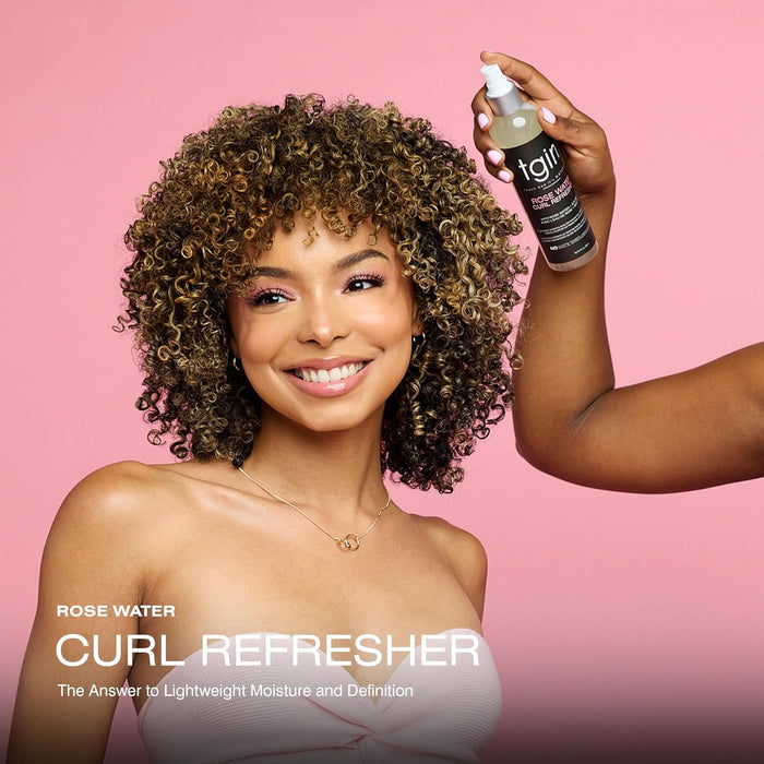 Tgin Rose Water Curl Refresher 8oz with a model and hand holding product spraying the hair