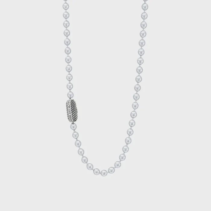 Silver ball chain necklace with textured clasp engraved Good Art HLWD on gray background