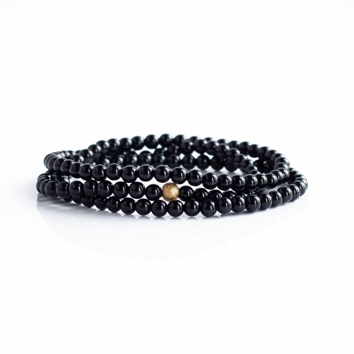 BLACK CORE GEM BEAD BRACELET