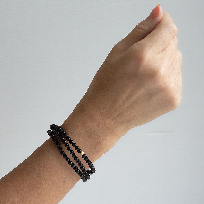 BLACK CORE GEM BEAD BRACELET