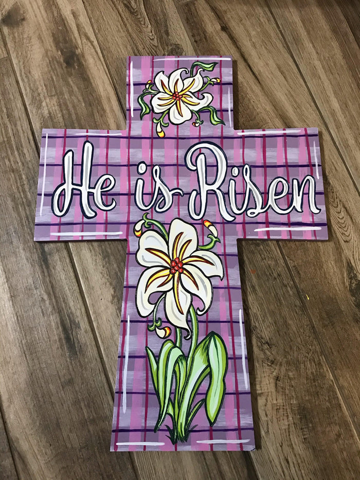 plaid purple he is risen cross with flowers on the top and bottom