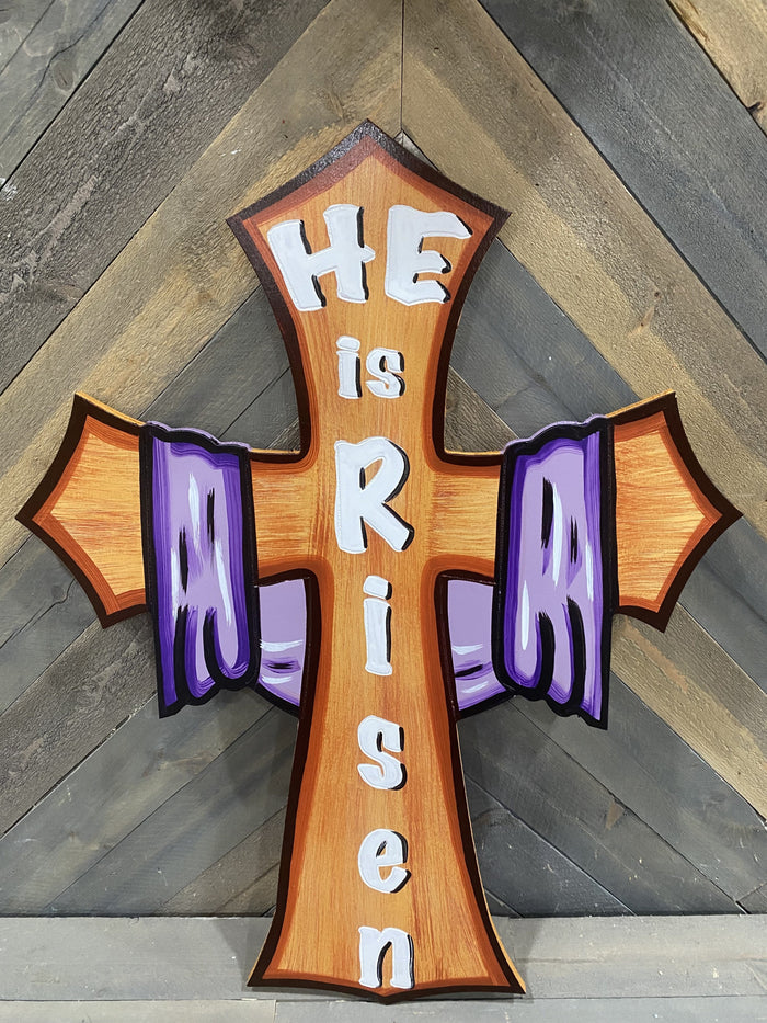 he is risen cross with purple scarf draped across
