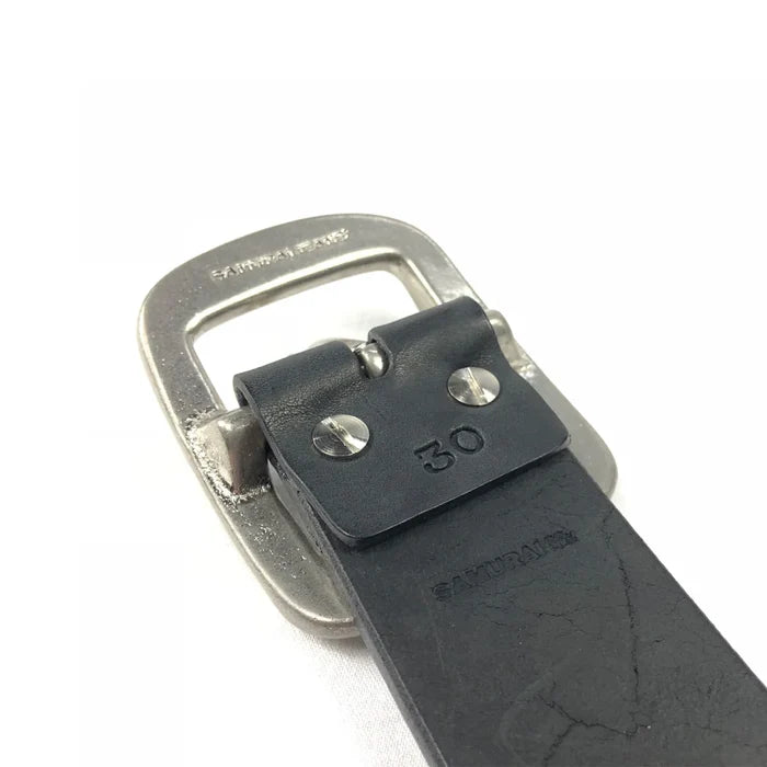 Close-up of black leather belt with metal buckle and size 30 embossed, Samurai Jeans branding