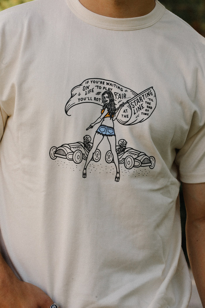 Cream starting line loopwheel tee with vintage woman flag girl illustration and classic race cars design