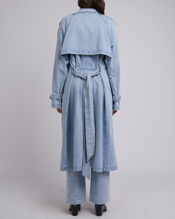 Oversized light blue denim trench coat