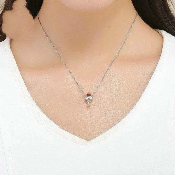Woman wearing elegant wine goblet necklace pendant