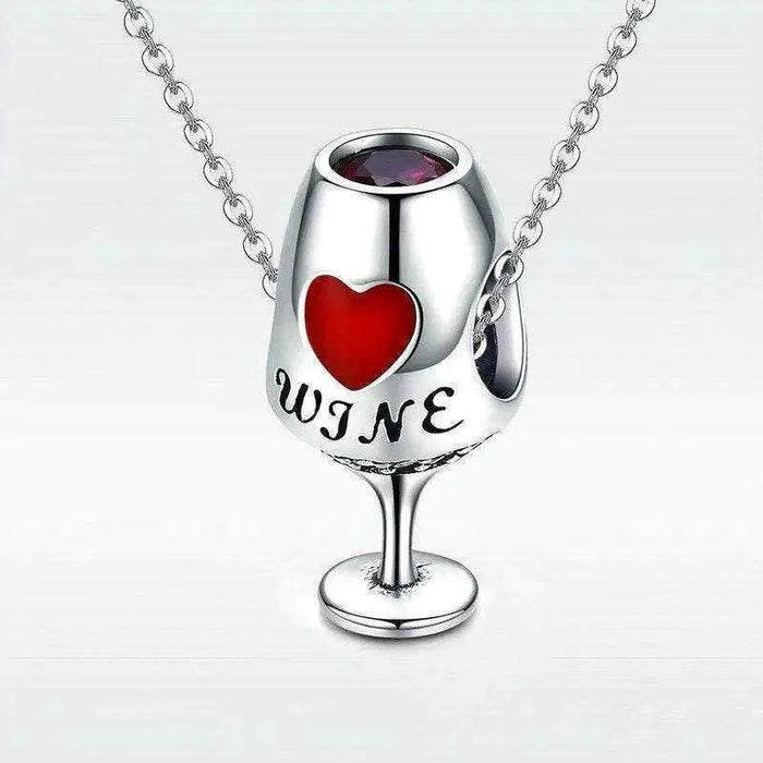 Close-up of wine glass charm on necklace pendant